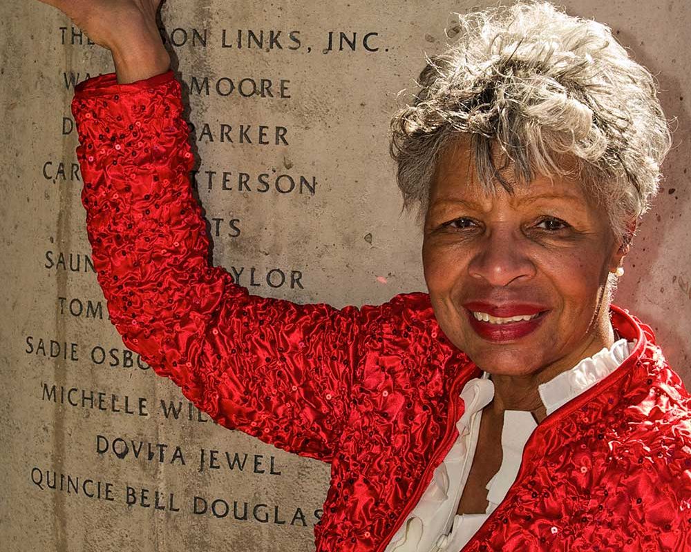 African American Women's Arch member